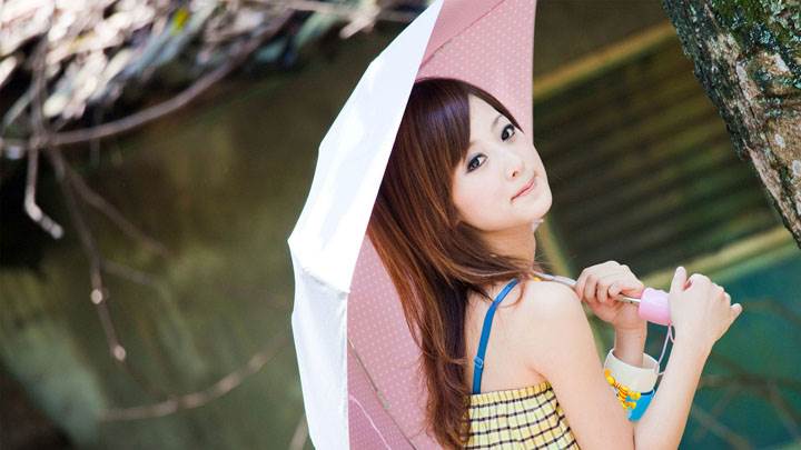 Asian Girl With Pink Umbrella Side Pose